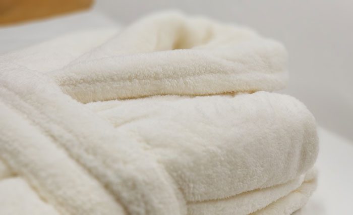Our luxurious spa robes have become so popular because of their durability, lightweight feel an incredible softness. These robes hold up well against multiple machine washings and dry fast. Our spa robes look like terry and will not pill. Great His and Hers wedding gift.